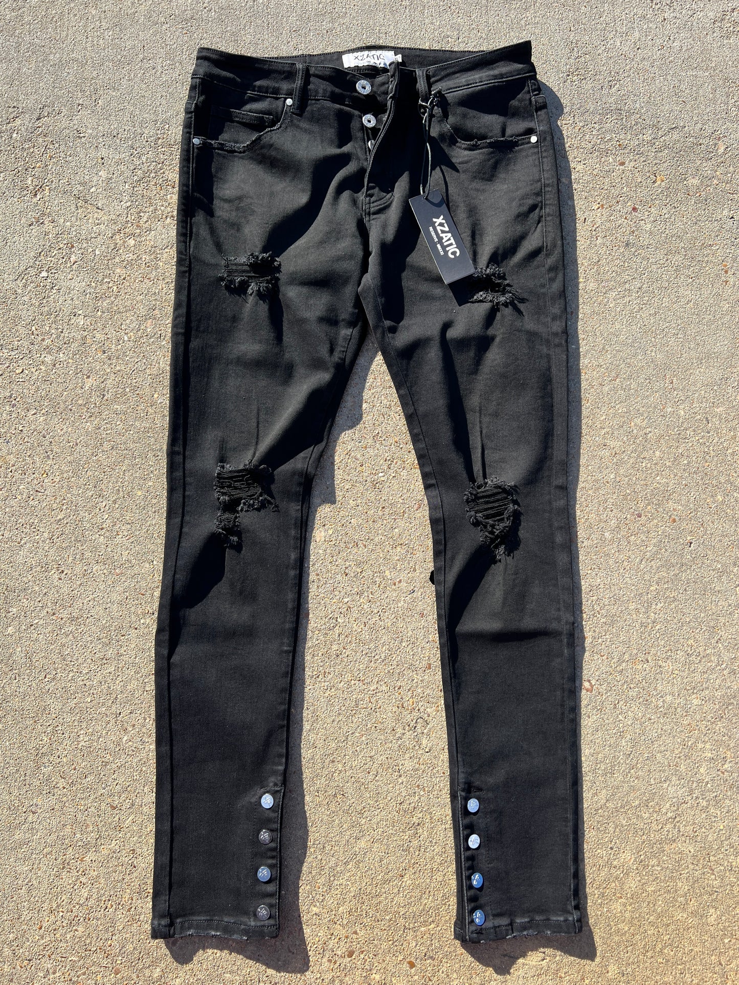 Black Xzatic denim with button up pants leg