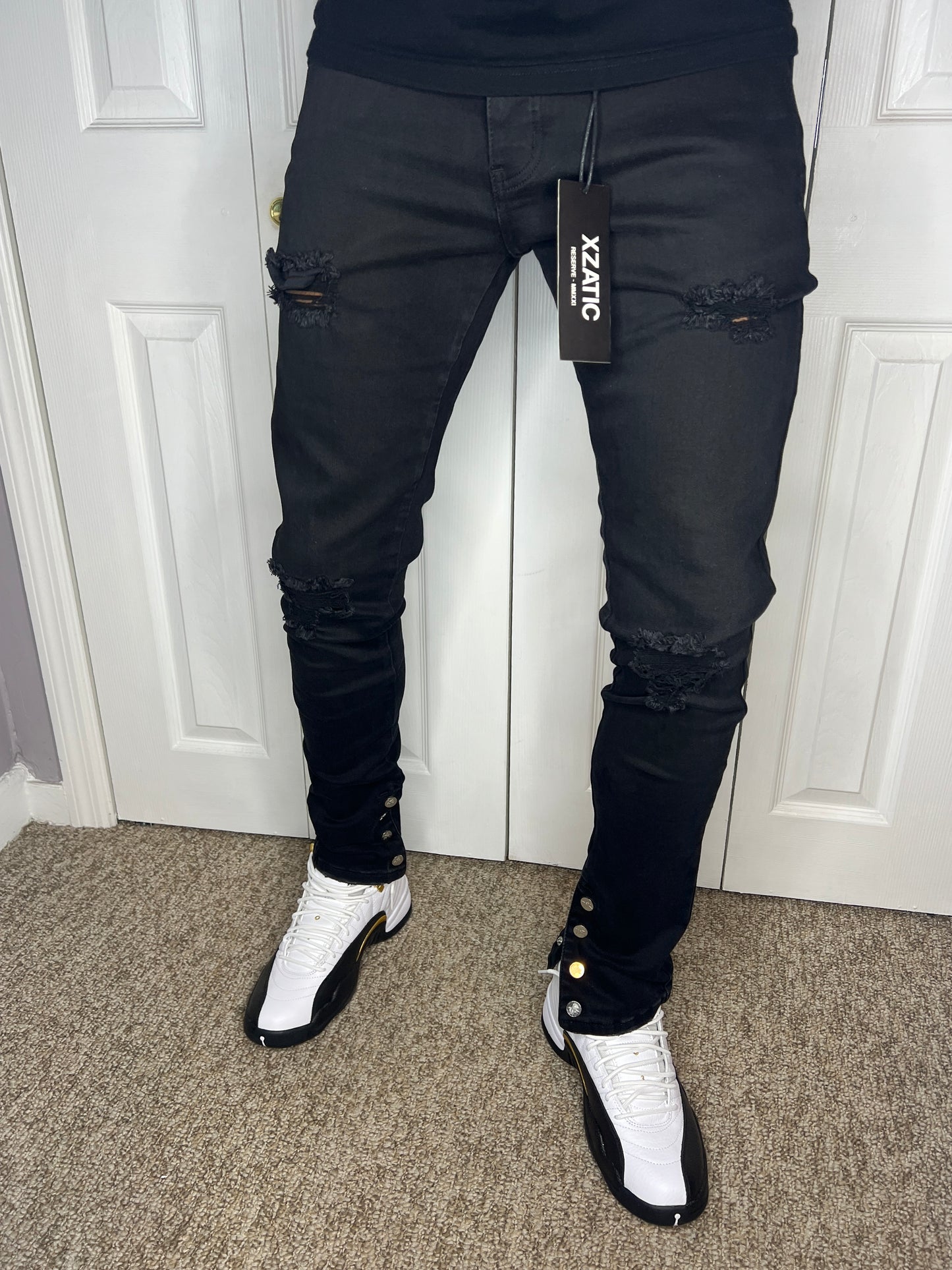 Black Xzatic denim with button up pants leg